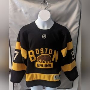 Vintage Reebok NHL Boston Bruins Patrice Bergeron #37 Jersey Youth Size S/M